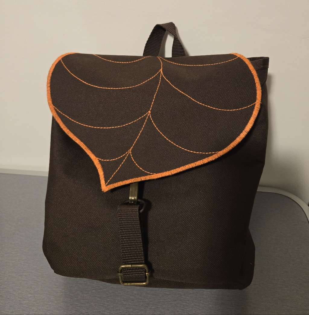Brown Leaf Mini Backpack With Orange Accents